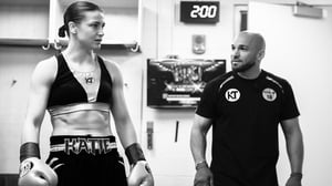 Katie Taylor and coach Ross Enamait prepare for her lightweight showdown with Delfine Persoon.