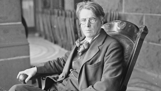 William Butler Yeats, well-known Irish poet, sitting in a rocking chair on the porch of a building, Chicago, Illinois, March 1920. Photo by Chicago Sun-Times/Chicago Daily News collection/Chicago History Museum/Getty Images