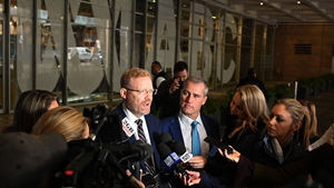 ABC's editorial director Craig McMurtrie speaks to the media after the police raid