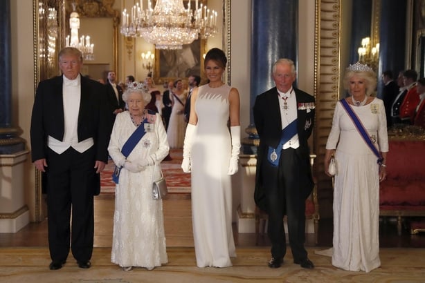 Trump, Queen Elizabeth II, Melania Trump, the Prince of Wales and the Duchess of Cornwall, during a group photo ahead of the State Banquet at Buckingham Palace, London, on day one of US President Donald Trump's three day state visit to the UK