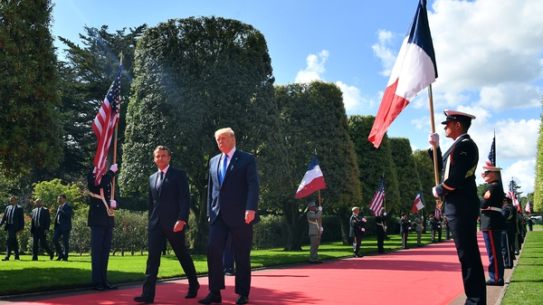 Emmanuel Macron and Donald Trump attending a D-Day commemoration