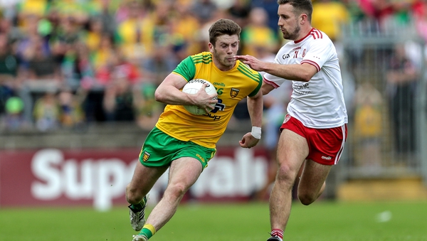 Donegal's Eoghan Ban Gallagher and Niall Sludden of Tyrone compete during last year's quarter-final clash