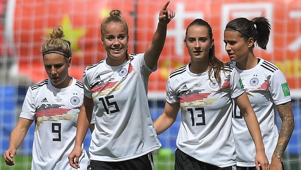 Giulia Gwinn (15) celebrates with her Germany team-mates after scoring the only goal of the game