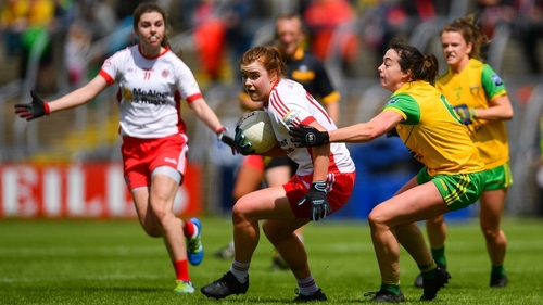 Niamh O'Neill of Tyrone evades Nicole McLaughlin of Donegal