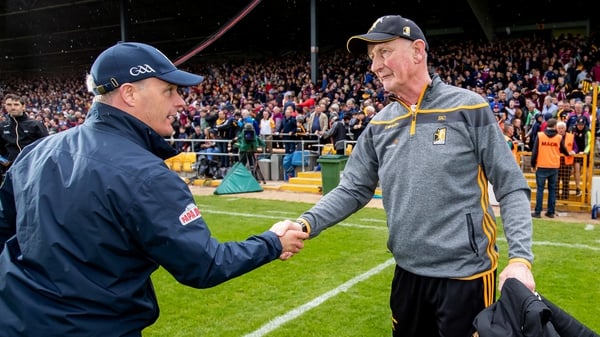Micheal Donoghue (l) shakes hands with Brian Cody after the game