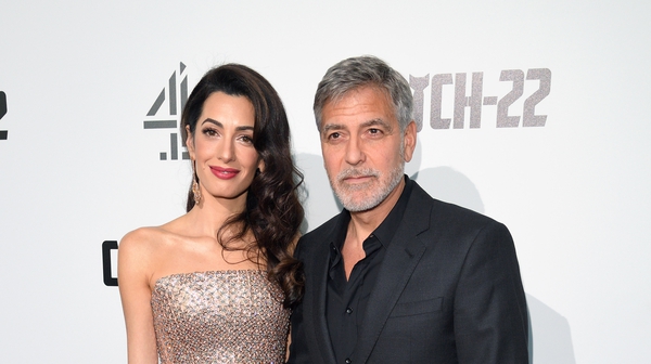 Amal and George Clooney: million dollar donation