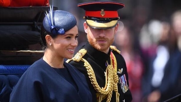 The Duke and Duchess of Sussex make their way along The Mall to Buckingham Palace, in London, after the Trooping the Colour ceremony, as Queen Elizabeth II celebrates her official birthday (PA)