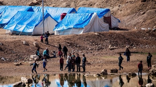 The transfer took place in the town of Ain Issa, home to a large refugee camp