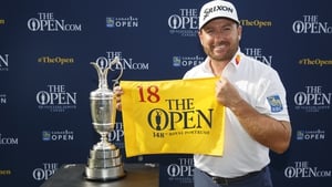 Graeme McDowell was presented with an Open flag following qualification