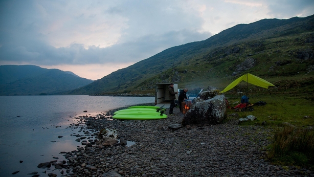 Preparing for some night SUP at Cloon Lough (Tadhg Hayes/PA)