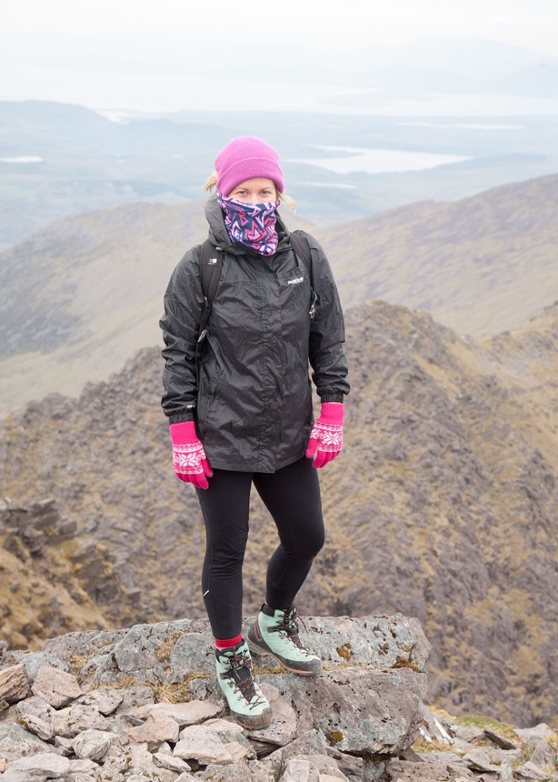 Abi Jackson at the summit of Carauntoohil (Tadhg Hayes/PA)