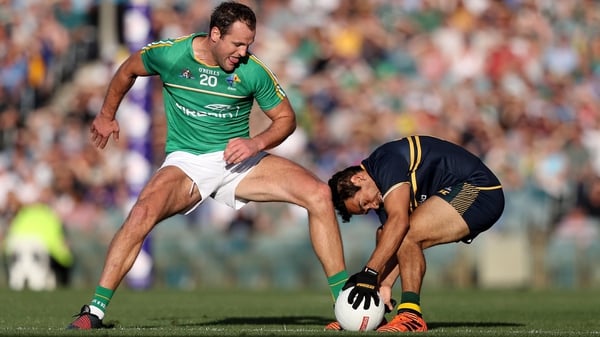 Ireland's Michael Murphy and Eddie Betts of Australia compete for the ball in 2017