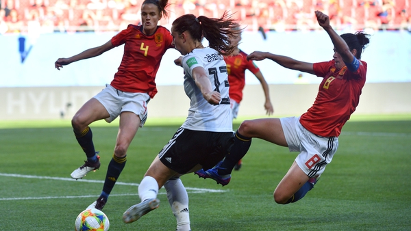 Spain's Marta Torrejon (R) and Irene Paredes (L) try to block Germany's goalscorer Sara Dabritz