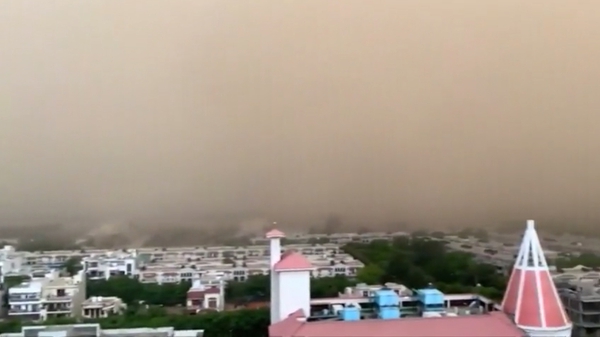 The city was experiencing a heatwave before the dust storm and rain brought temperatures down, according to local reports