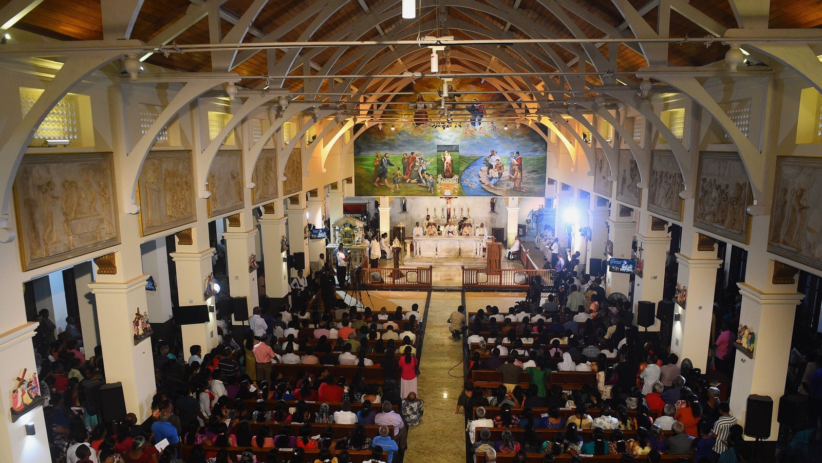 Sri Lankans celebrate mass at restored church