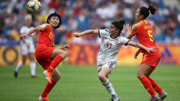 Yan Wang of China is challenged by Lucia Garcia of Spain