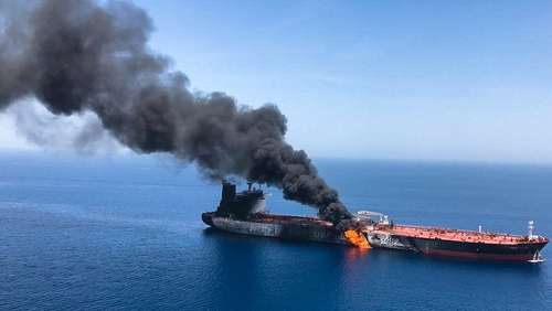 The crude oil tanker Front Altair on fire in the Gulf of Oman on 13 June