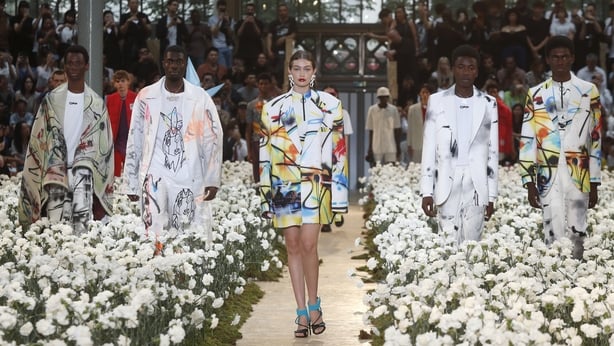Gigi Hadid led the finale of models walking through the field of flowers (Thibault Camus/AP)