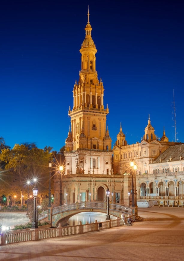 The historic Plaza de España in Seville is spotlit in the evening (Turismo de Sevilla/PA)