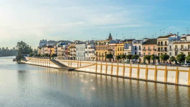 The riverside Betis Street is one of Triana's main draws (Turismo de Sevilla/PA)