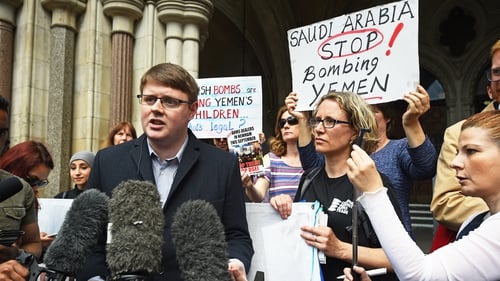 Andrew Smith, spokesperson for Campaign Against Arms Trade, speaks to the media outside the Royal Courts of Justice, London, after they won a landmark legal challenge