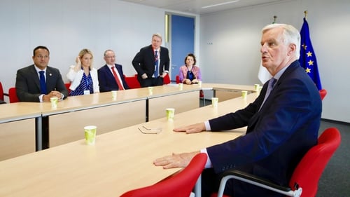 EU chief Brexit negotiator Michel Barnier (R) meets Leo Varadkar (L) on the sidelines of the EU summit