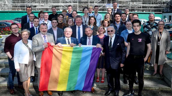 Seán Ó Feargháil was presented with the flag this afternoon