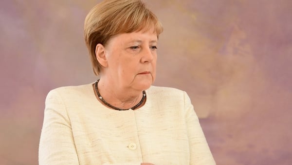 Angela Merkel was seen visibly shaking for about two minutes