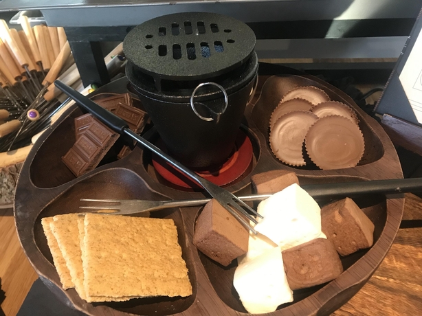 Platters of chocolate and marshmallow to toast over a flame are some of the fare to be offered from Universal's newsest restaurant (Jemma Crew/PA)