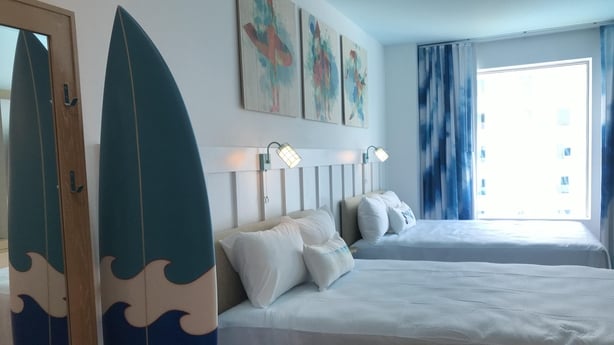 Surfboards and seascapes channel a relaxed beach vibe in the new budget resort (Jemma Crew/PA)