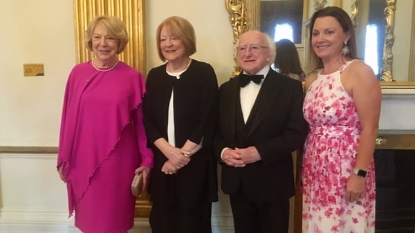 President Michael D Higgins and his wife Sabina, Kathleen Watkins and Suzy O'Byrne at the ceremony in Dublin Castle on Friday evening