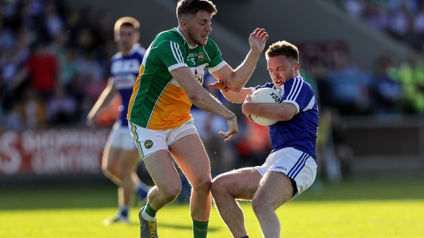 Laois' Ross Munnelly and Cian Donohoe of Offaly