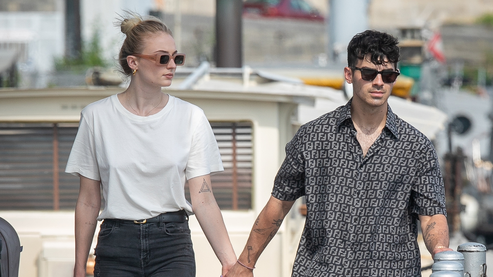 Joe Jonas And Sophie Turner Match In Red As Guests Wear White At