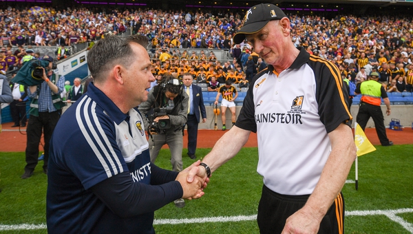 Davy Fitzgerald (L) and Brian Cody shake hands after Wexford's win at Croke Park