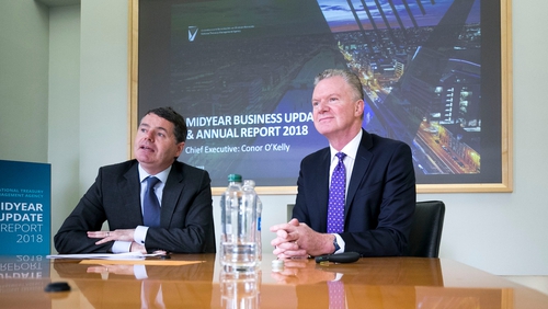 Finance Minister Paschal Dononhoe and NTMA CEO Conor O'Kelly at the launch of the agency's report for 2018