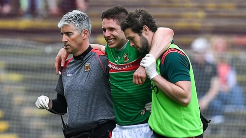 Keegan grimaces in pain as he leaves the field in Castlebar