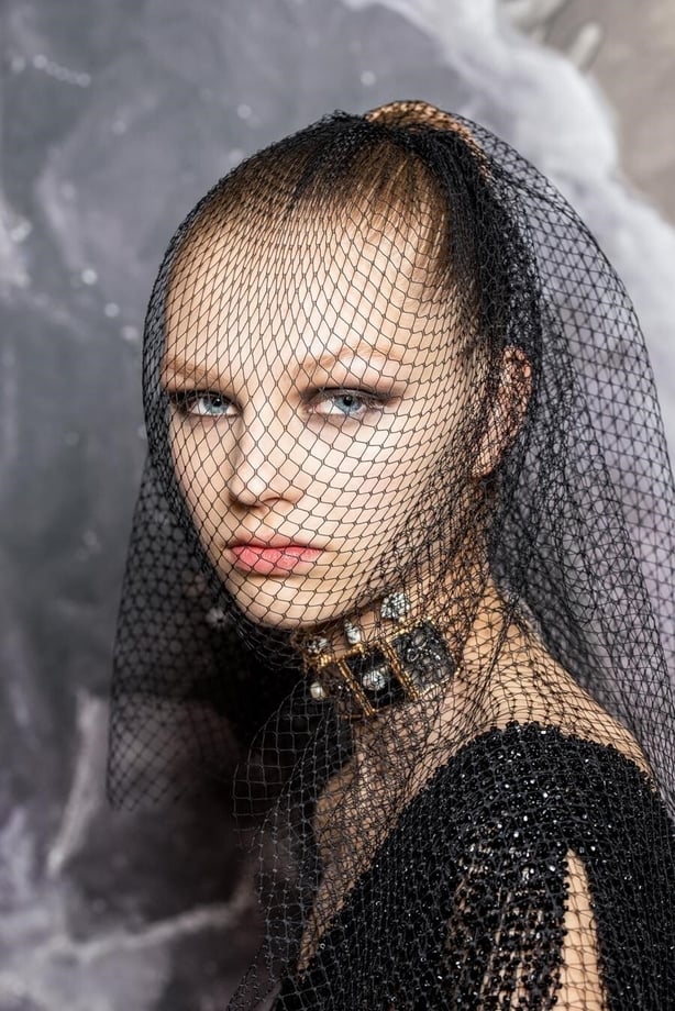 a model backstage at the Dior haute couture autumn/winter 2020 show