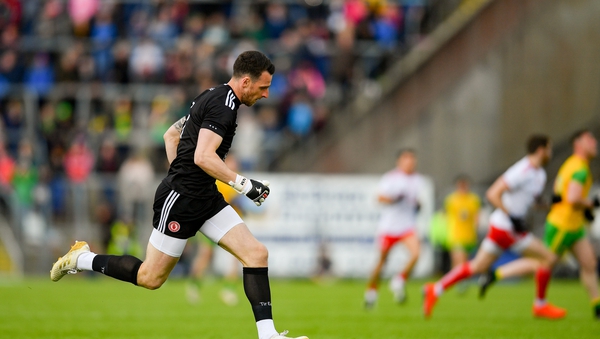 Tyrone goalkeeper Niall Morgan returns to his goal after making a break up the pitch