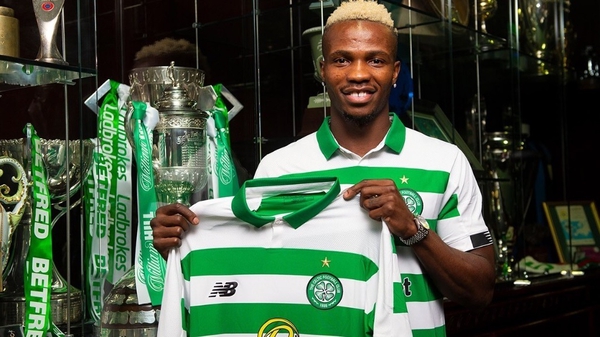 Boli Bolingoli-Mbombo poses with his new club's shirt. Photo: Celtic FC