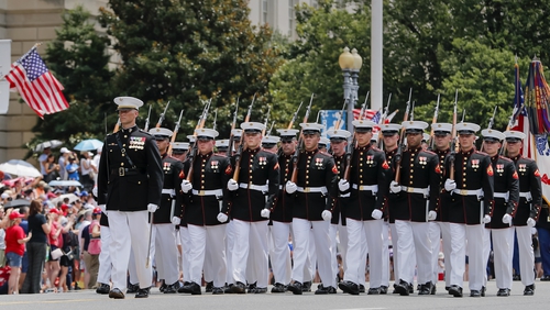 A US Marine Corps unit participates in 'America's Independence Day Parade' along Constitution Avenue in Washington DC
