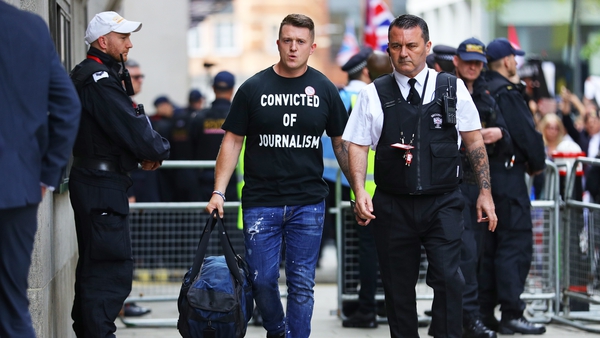 Tommy Robinson was arrested near the Royal Courts of Justice in London, where the protest began on Sunday (file pic: PA)