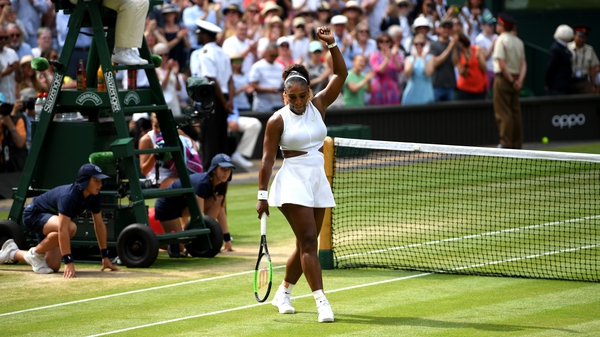 Williams celebrates after defeating Barbora Strycova