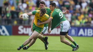 Hugh McFadden of Donegal in action against Shane McEntee of Meath