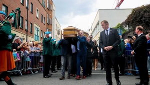 Hundreds of fans lined the street as Brendan Grace's coffin was led into the church