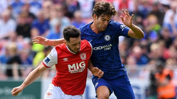 Eric Molloy challenges Chelsea's Marcos Alonso for the ball while trialling with St Pat's