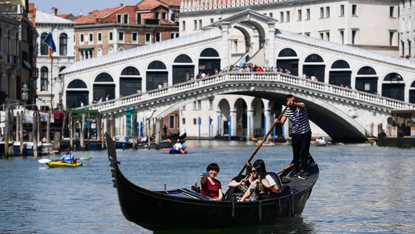 Venice risks 'irreversible' damage due to a string of issues ranging from climate change to mass tourism, according to UNESCO
