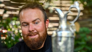 Shane Lowry eyes up the Claret Jug at today's press conference