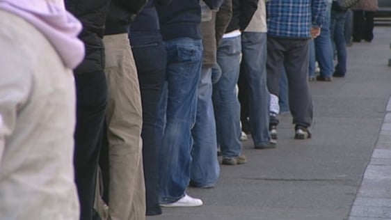 People standing in dole queue (2009)