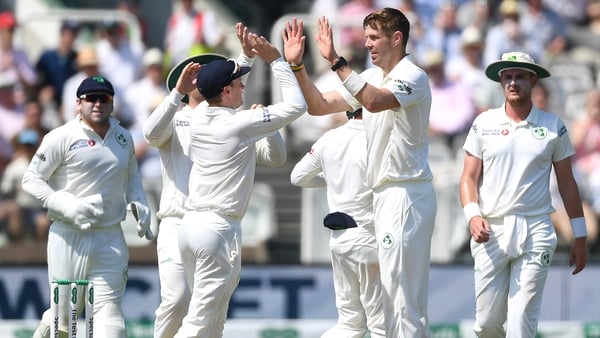 Boyd Rankin celebrates with team-mates after dismissing England opener Rory Burns