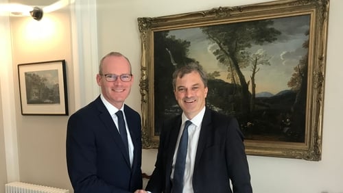 Simon Coveney and Julian Smith pictured at a meeting earlier this year